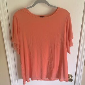 Torrid flutter sleeve shirt. Color peach. Super cute top with jeans or trousers.
